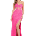 A woman modeling a bright hot pink one-shoulder evening gown with a sweetheart neckline, a front cutout at the waist, and a high thigh slit, set against a plain white background.