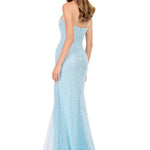 Woman wearing a light blue strapless evening gown on a white background