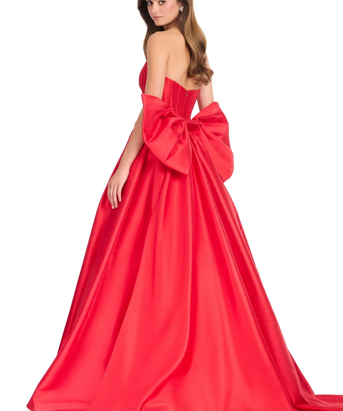 Red evening gown with a large bow detail on a white background
