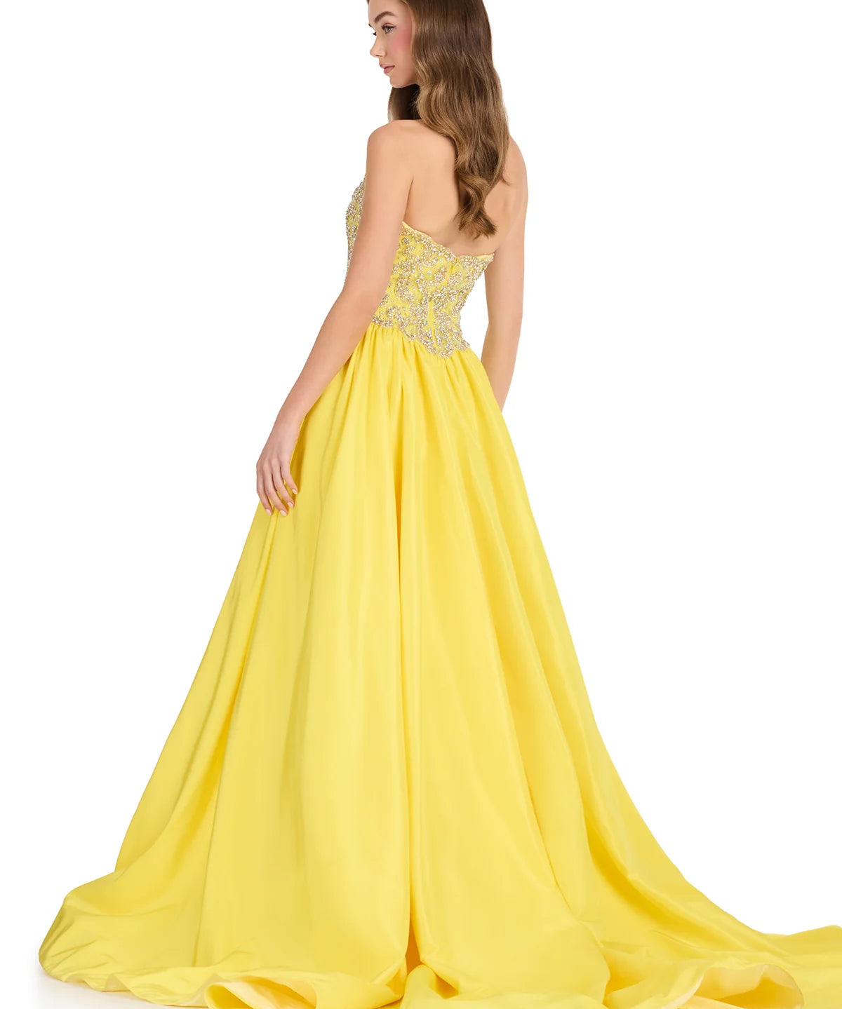 A woman modeling a strapless yellow ball gown with a beaded bodice, shown from the back against a plain white background.