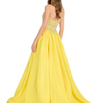 A woman modeling a strapless yellow ball gown with a beaded bodice, shown from the back against a plain white background.