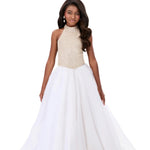 Woman wearing a white gown with a beaded top on a white background