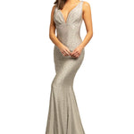 A woman modeling a floor-length, sleeveless evening gown with a deep V-neckline, fitted silhouette, and subtle beaded embellishments on a plain white background.