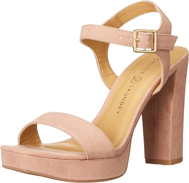 A single women's platform sandal with a high block heel, featuring a wide toe strap and an ankle strap with a gold buckle, in a dusty pink color.