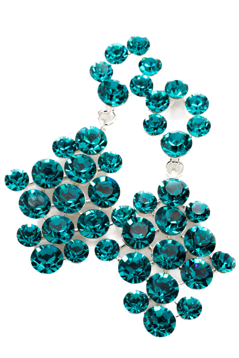 Teal rhinestone decorative item on a white background