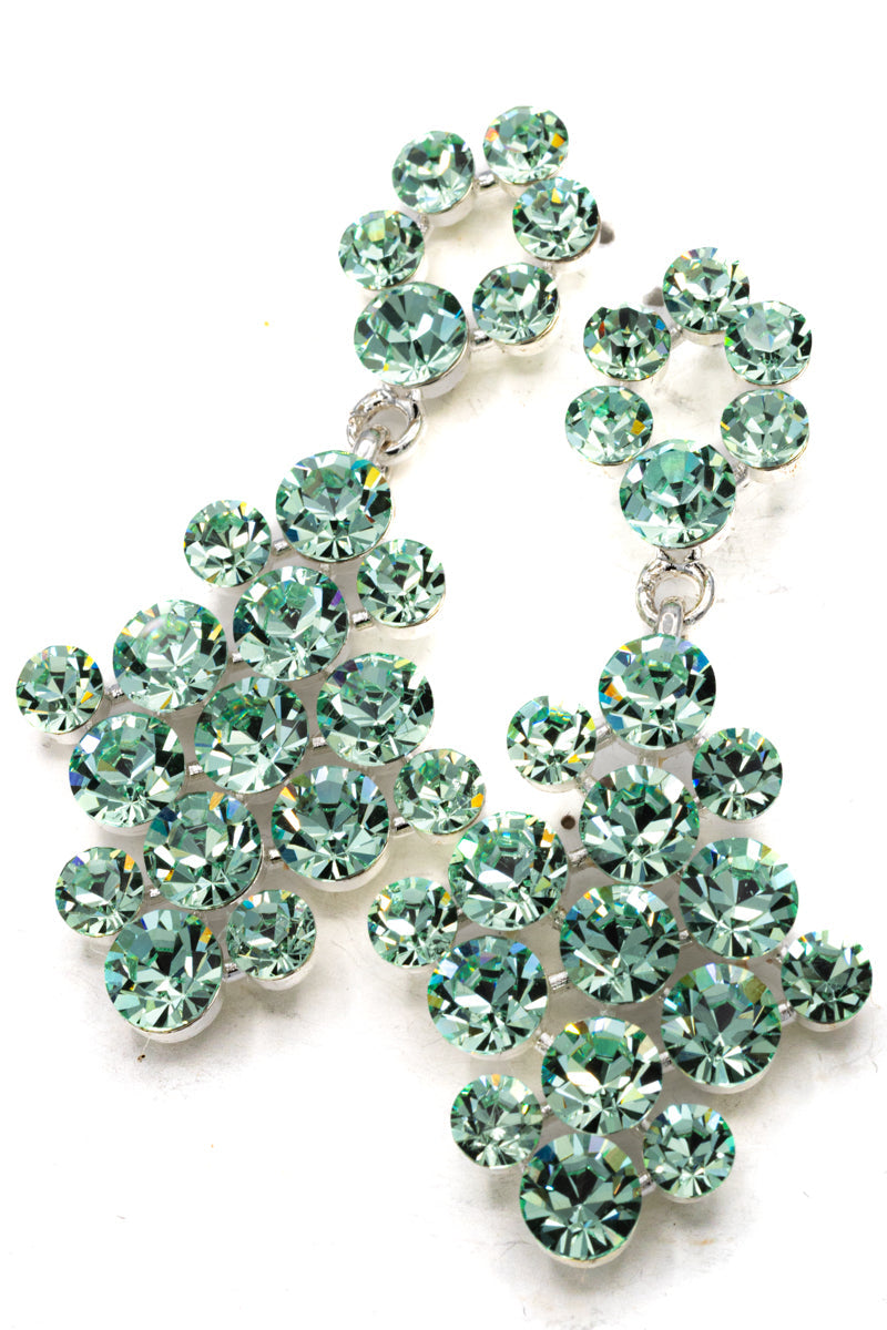 Green gemstone earrings on a white background - pageant/formal