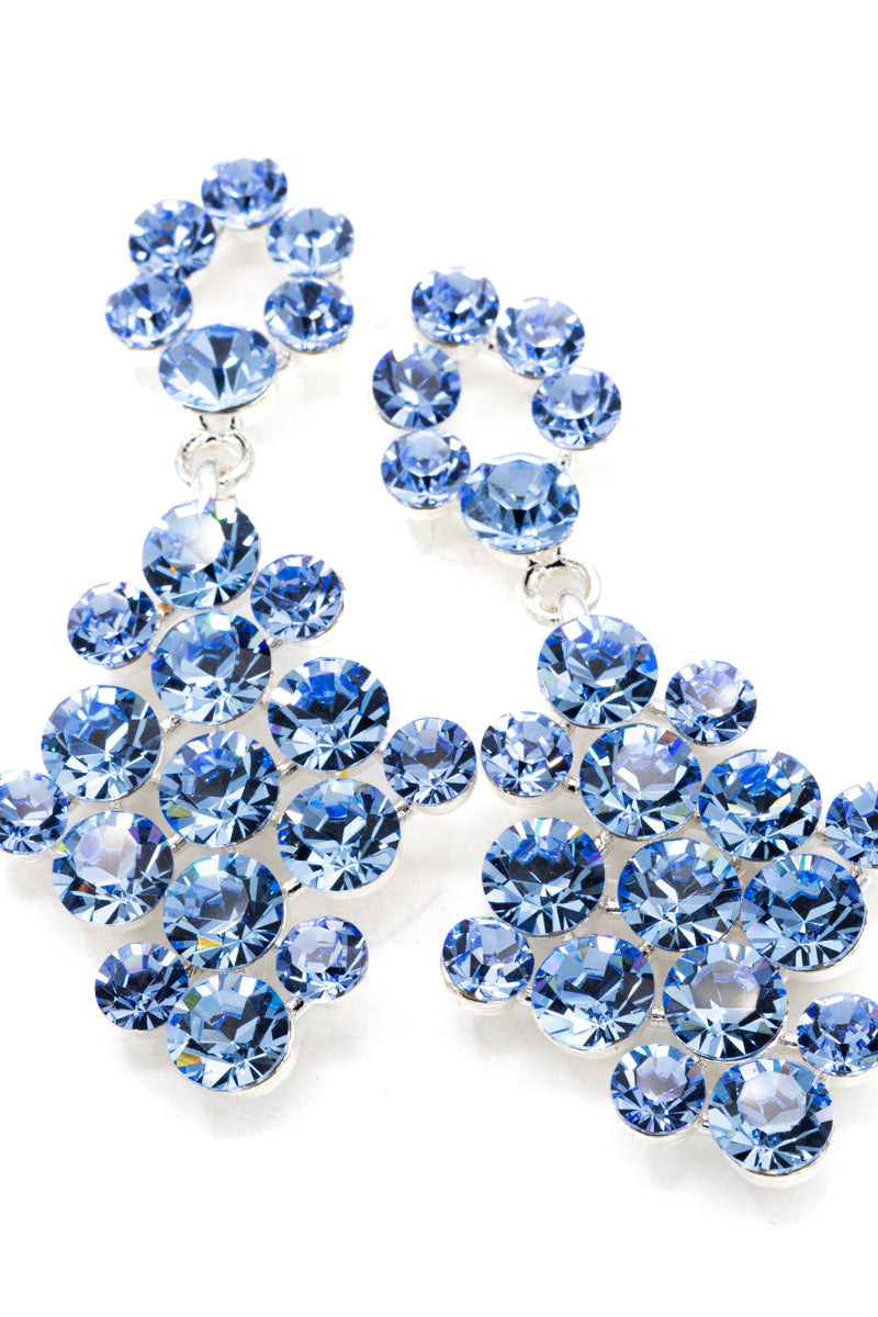 Blue crystal earrings on a white background