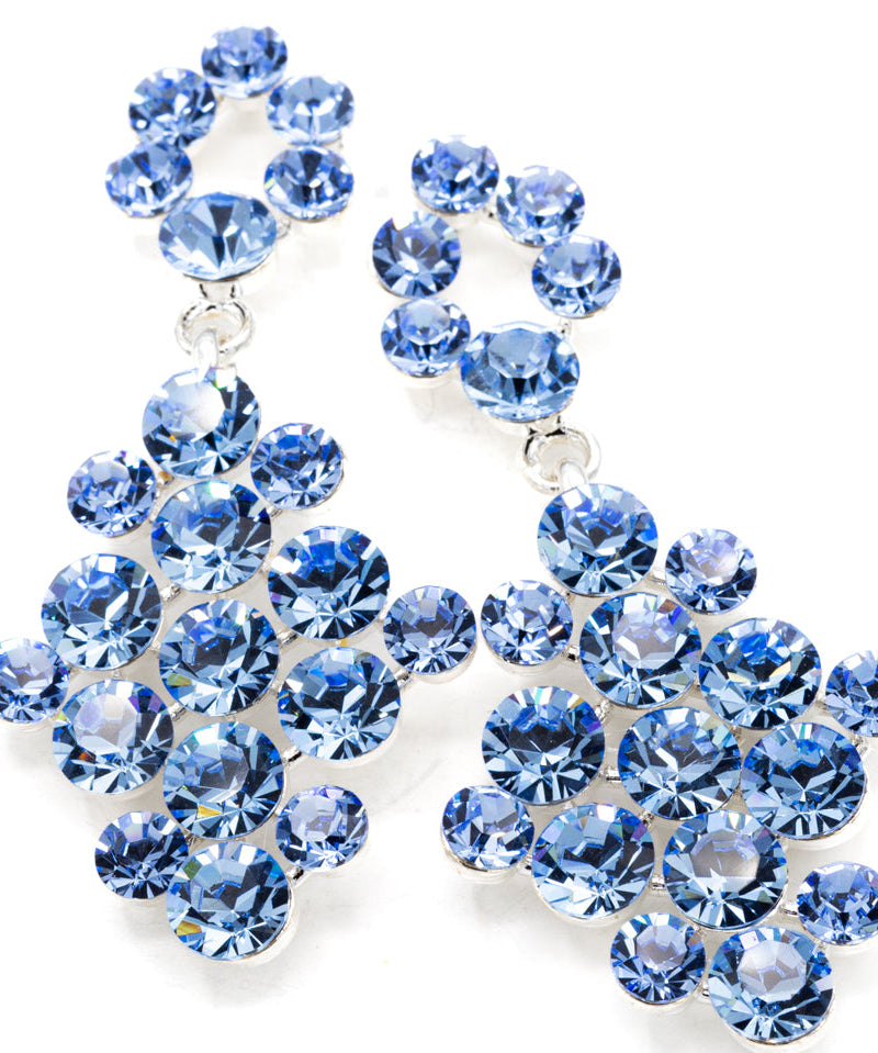 Blue crystal earrings on a white background