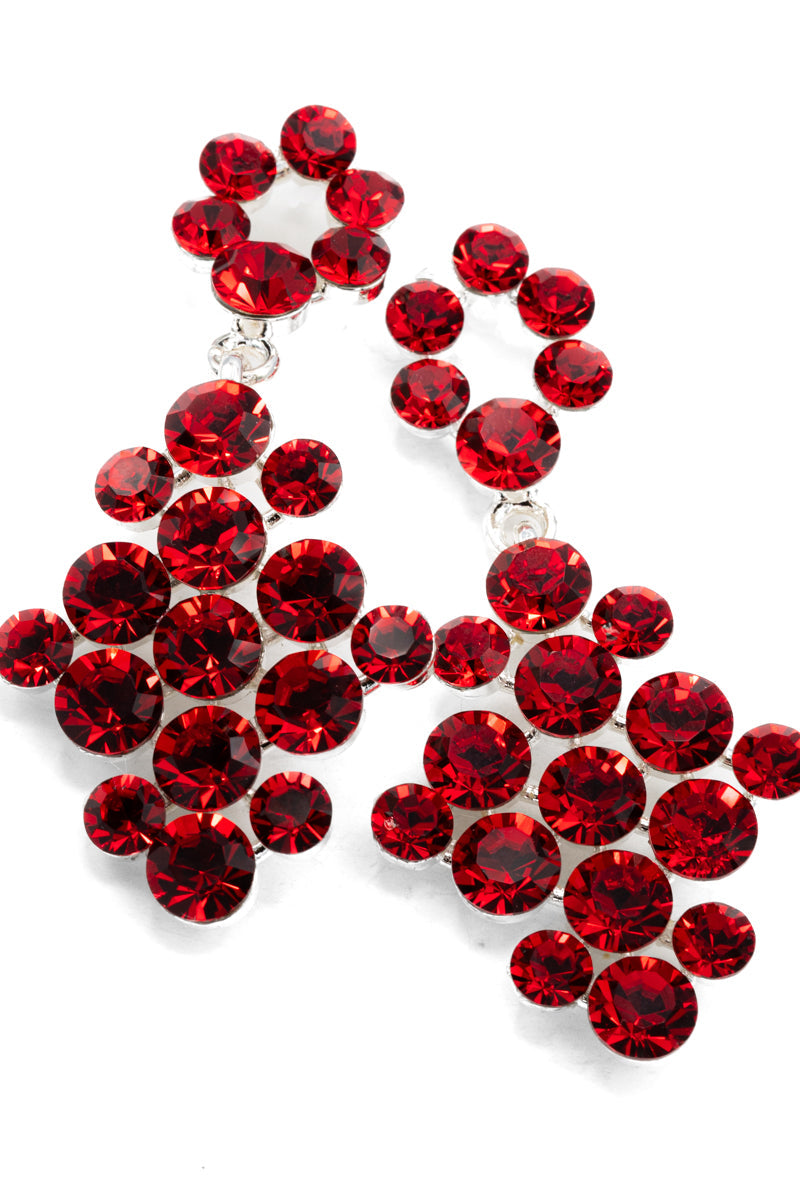 Red gemstone earrings on a white background