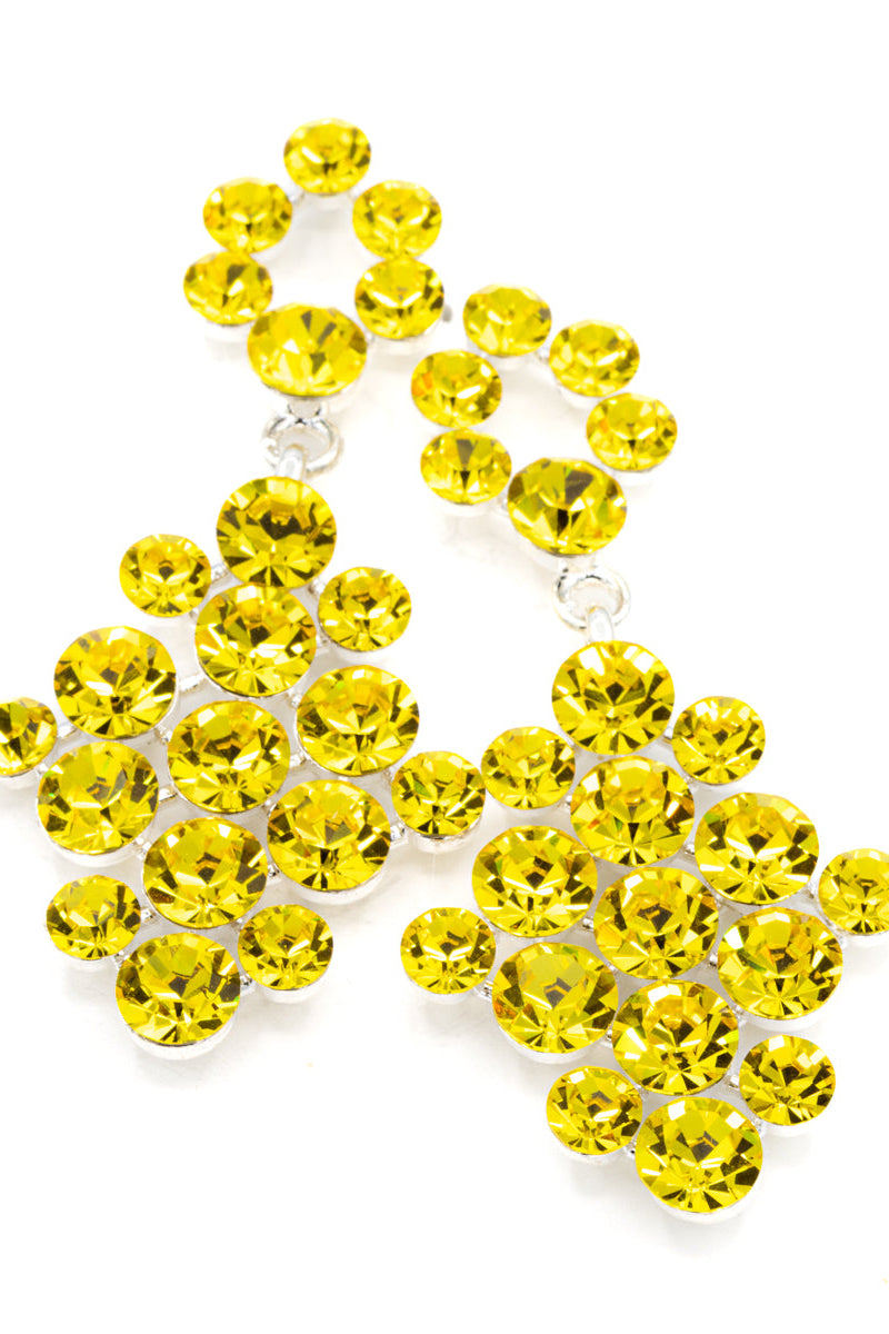 Yellow gemstones on a white background