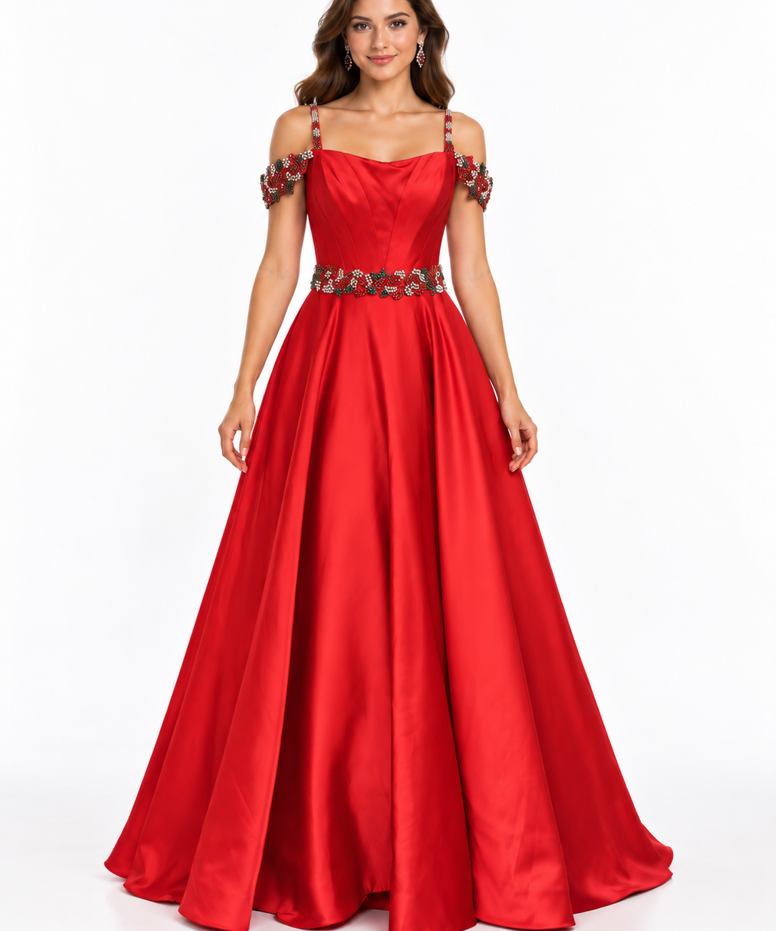 A woman modeling a bright red off-the-shoulder A-line gown with a beaded waistband, photographed against a plain white studio background.
