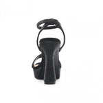 RSG Formals DeBlossom Regina black shimmer block heel sandals with an adjustable ankle strap and open toe design.