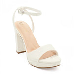 RSG Formals DeBlossom Jane white open-toe block heels with an adjustable ankle strap and matte finish