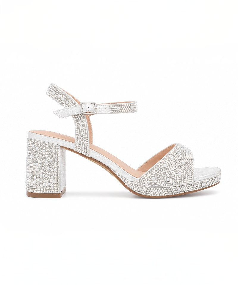 RSG Formals DeBlossom Nelly white shimmer block heel sandals with rhinestone embellishments and ankle strap