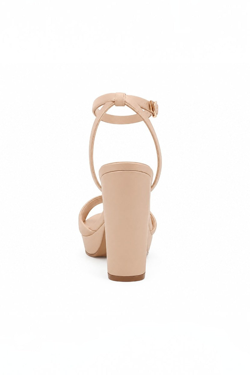 RSG Formals DeBlossom Jane nude block heel sandals with an adjustable ankle strap and matte finish, back view.