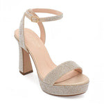 RSG Formals DeBlossom Regina nude shimmer block heels with rhinestone embellishments and adjustable ankle strap.