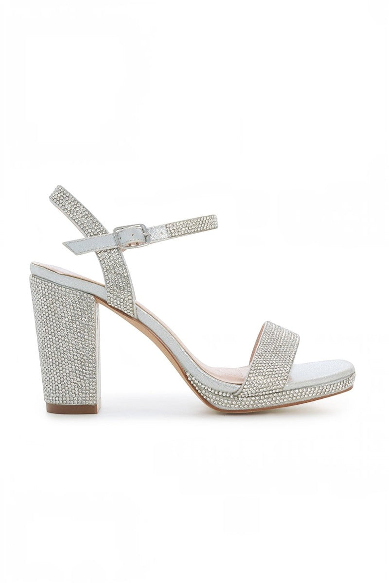 RSG Formals DeBlossom Morita silver shimmer block heel sandals with ankle strap and platform for formal occasions.