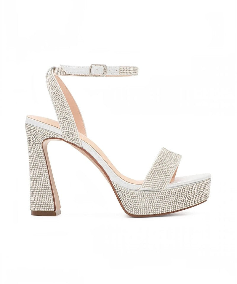 RSG Formals DeBlossom Regina silver shimmer platform heels with block heel, open toe, and adjustable buckle strap.