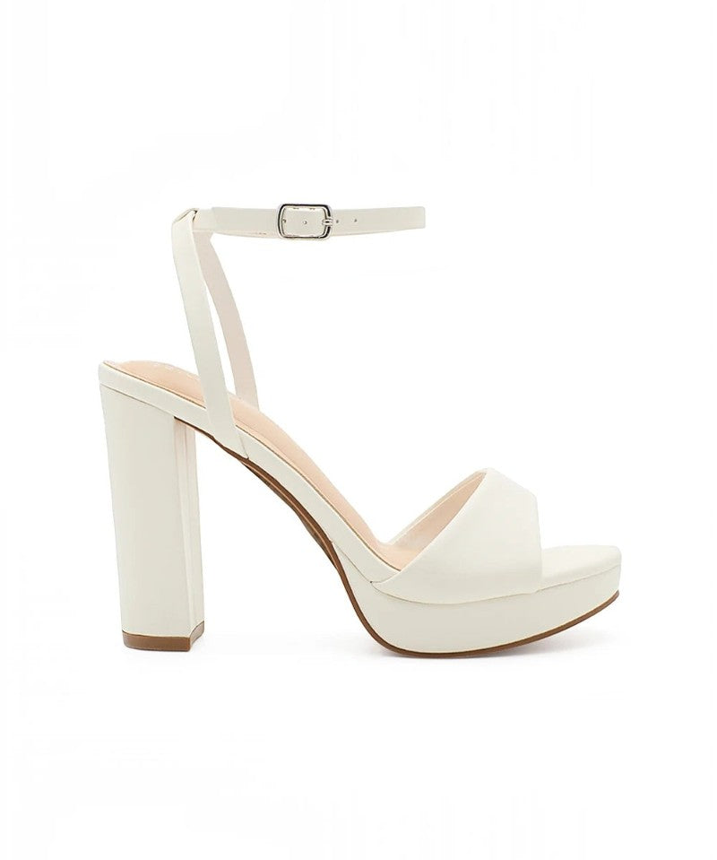 RSG Formals DeBlossom Jane white open-toe platform heels with an adjustable ankle strap and sturdy block heel.